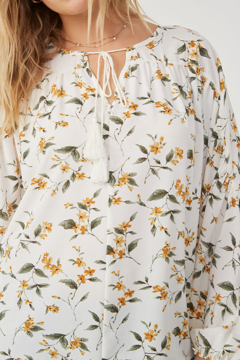 HY6121W Yellow Plus Floral Tasseled Gathered Dolman Top Gif