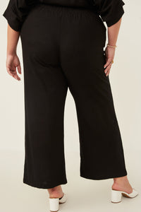 HY6124W Oatmeal Plus Wide Leg Paperbag Waist Pants Pose
