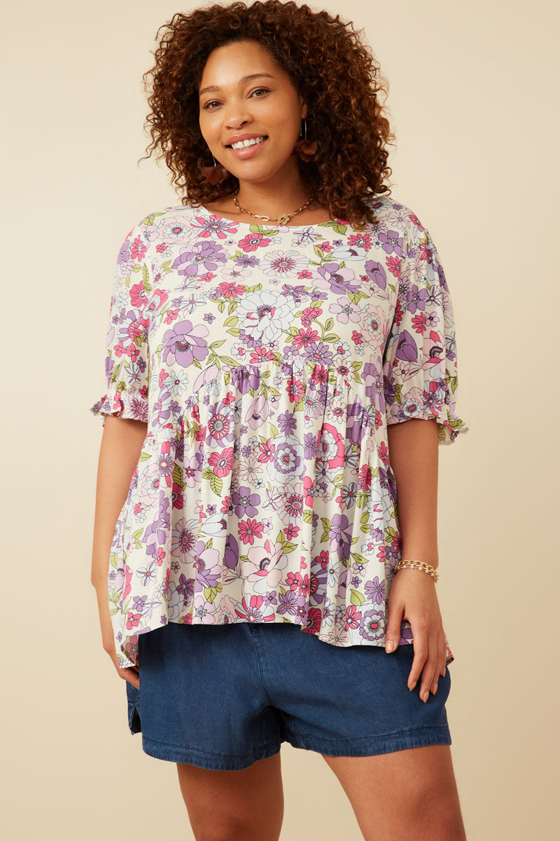 Floral Rounded Hem Peplum Top