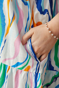 HY7976W Green Mix Plus Abstract Lines Button Detail Ruffle Sleeve Dress Detail